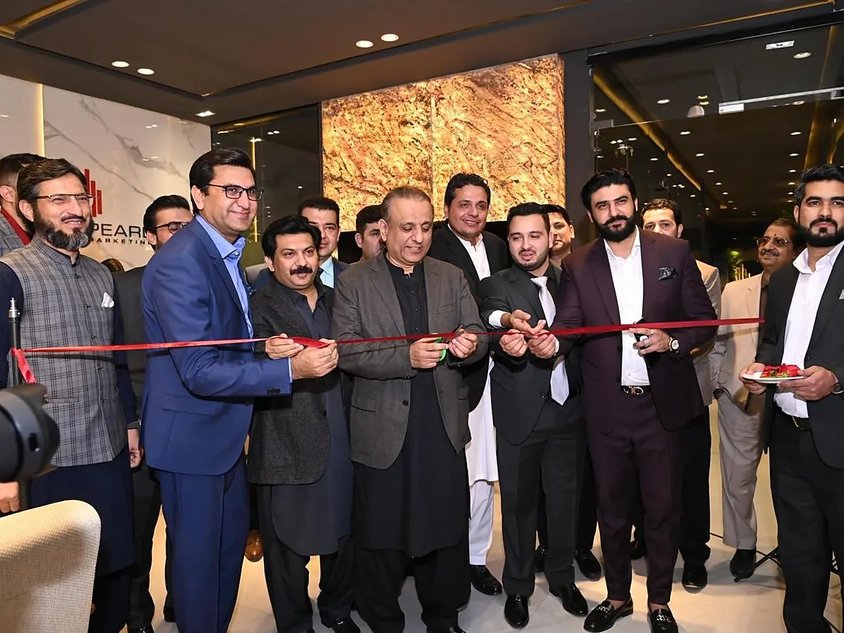 Ribbon cutting at the Pearl Marketing office inauguration in Blue Area, Islamabad, managed by Blackfire