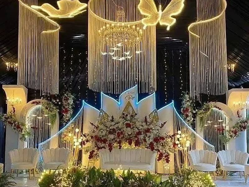 Wedding stage decor design 1 — floral stage, sofa and backdrop