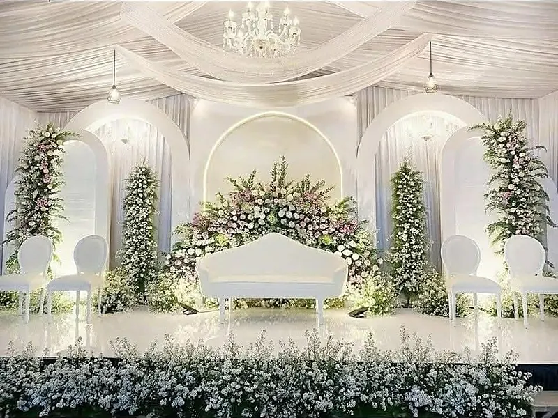 Wedding stage decor design 2 — floral stage, sofa and backdrop