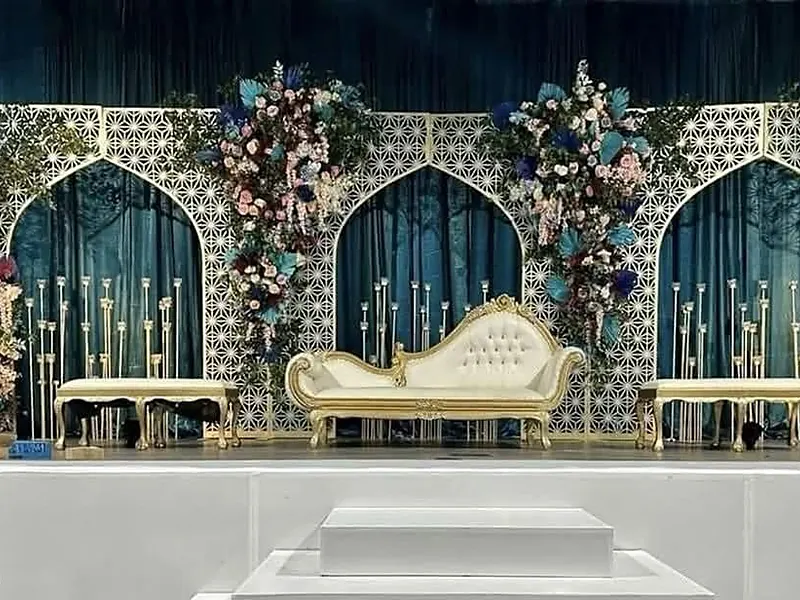 Wedding stage decor design 9 — floral stage, sofa and backdrop