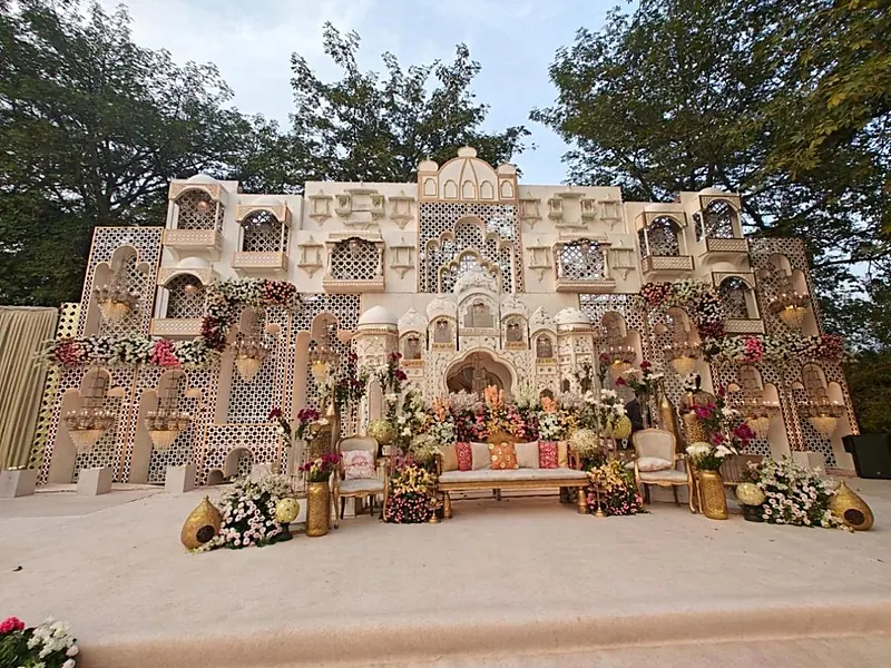 Wedding stage decor design 10 — floral stage, sofa and backdrop