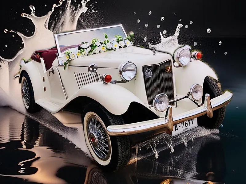 Vintage white car decorated for a groom entry