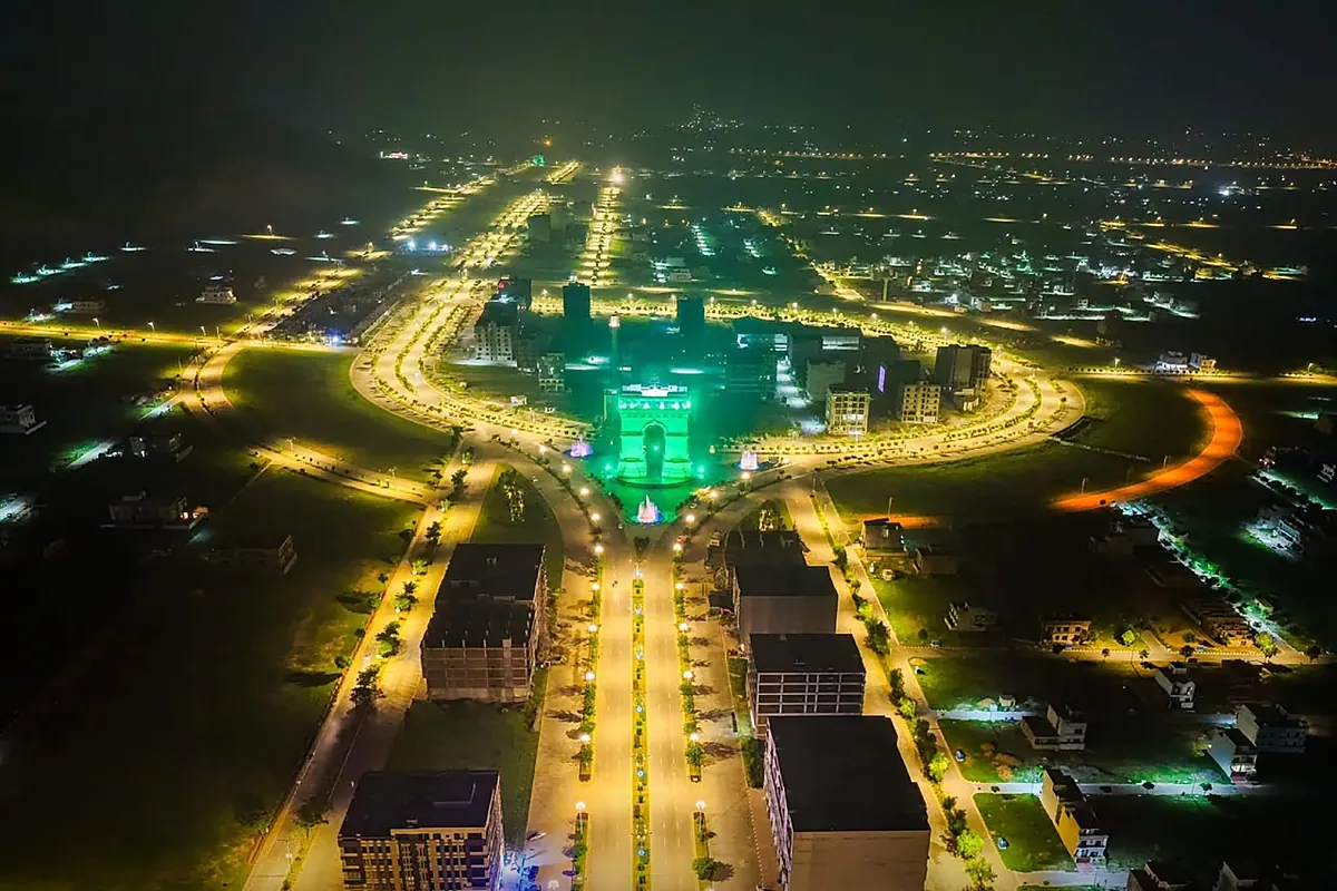 Aerial night view of Faisal Hills, one of the societies Blackfire Real Estate deals in