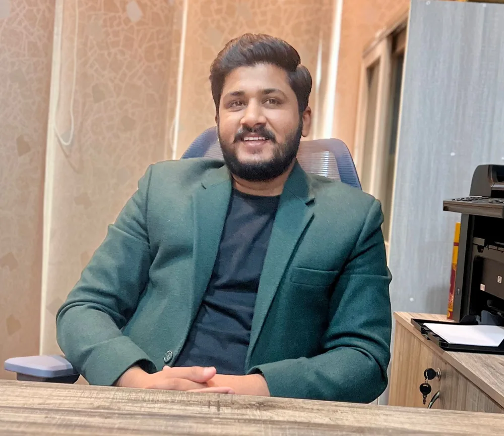 Mr Salman Anjum, CEO of Blackfire Group of Companies, at his office desk